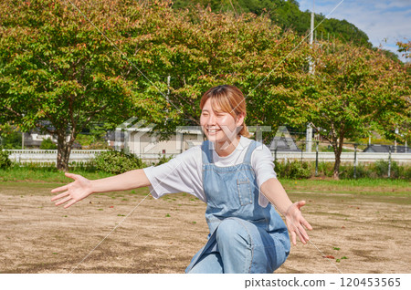 Nursery teachers playing in the park, countryside Nursery teachers playing in the park, countryside 120453565