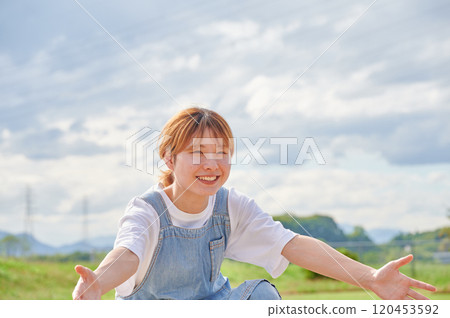 Nursery teachers playing in the park, countryside 120453592