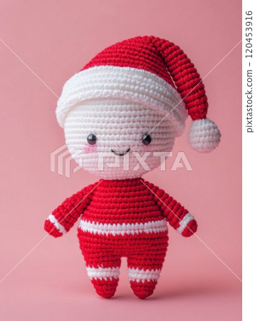 Festive Christmas Amigurumi Crochet Pattern with Textured Outfit Isolated on Solid Background 120453916