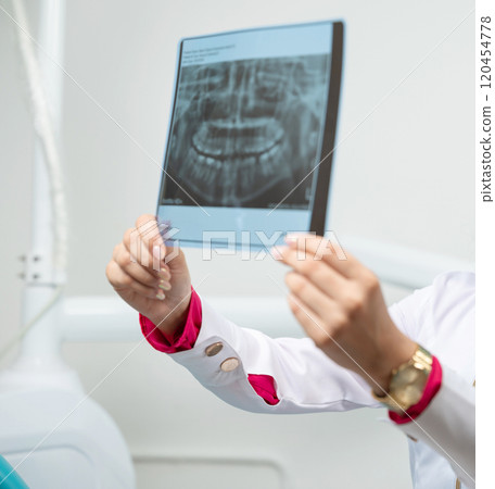 Dentist hold xray scan 120454778