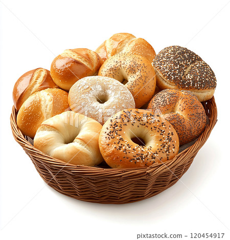 A basket of breads, bagels, and French rolls, isolated on a white background. 120454917