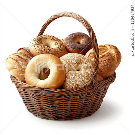 A basket of breads, bagels, and French rolls, isolated on a white background. 120454934