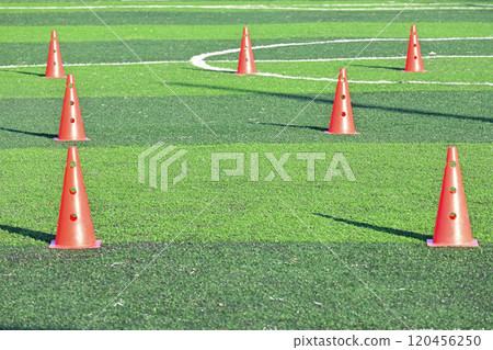 artificial green grass soccer field with orange training cones artificial green grass soccer field with orange training cones 120456250