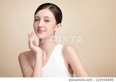 Beautiful young asian woman with clean fresh skin on beige background, Face care, Facial treatment, Cosmetology, beauty and spa, Asian women portrait. 120458899