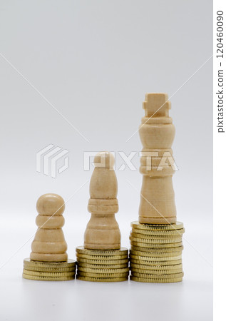 Status and ambition represented by pawns on golden coins with customizable space for text Status and ambition represented by pawns on golden coins with customizable space for text 120460090