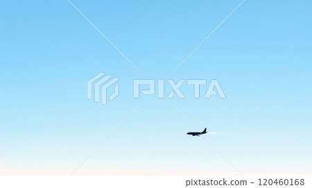 Airplane silhouette against clear blue sky, minimalistic scenery. Adventure and travel concept 120460168