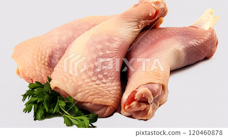 Savory indulgence, Chicken legs adorned with herbs on a white isolated background 120460878