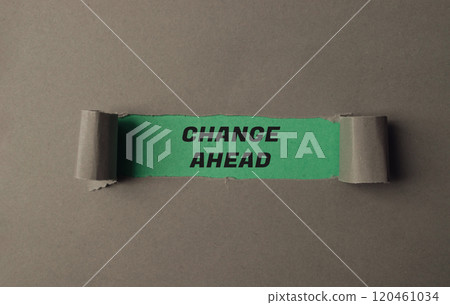 A torn piece of paper with the words change ahead written on it A torn piece of paper with the words change ahead written on it 120461034