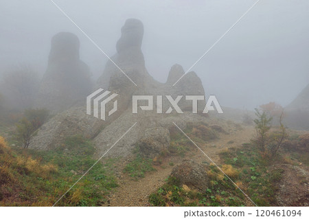 Narrow path along the misty mountainside. 120461094