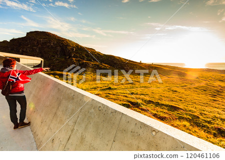 Andoya island sea coast and tourist with norwegian flag Andoya island sea coast and tourist with norwegian flag 120461106