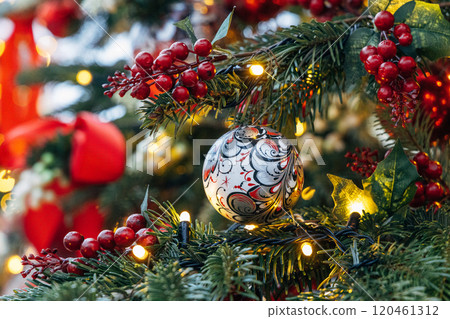 New Year's colorful trees in front of the Central Department Store in Moscow on Kuznetsky Most 120461312