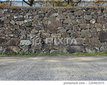 Ancient stone wall of Kokura castle where is a landmark in Kitakyushu, Japan. It was built in 1602. 120462035