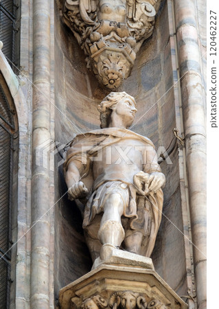 Statue of Saint on the facade of the Milan Cathedral, Duomo di Santa Maria Nascente, Milan, Lombardy, Italy 120462227