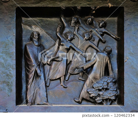 Thou shalt not abuse the name of God, relief on the door of the Grossmunster ("great minster") church in Zurich, Switzerland Thou shalt not abuse the name of God, relief on the door of the Grossmunster ("great minster") church in Zurich, Switzerland 120462334