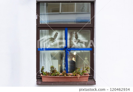 The elegant classical facade of the building with a stained glass window, a beautiful pattern, The elegant classical facade of the building with a stained glass window, a beautiful pattern, 120462934