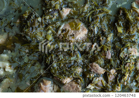 Traditional Georgian spring dish Chakapuli with meat, green plums and herb mix Traditional Georgian spring dish Chakapuli with meat, green plums and herb mix 120463748