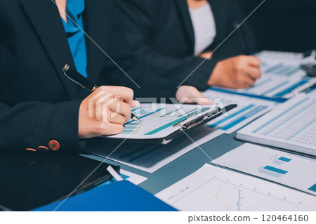 Fund managers team consultation and discuss about analysis Investment stock market at office 120464160