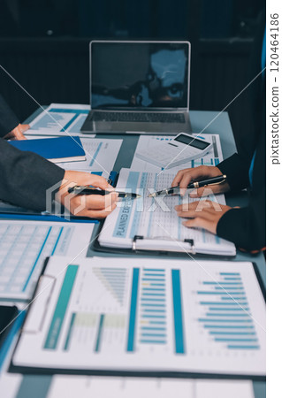 Fund managers team consultation and discuss about analysis Investment stock market at office 120464186