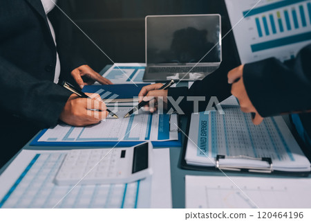Fund managers team consultation and discuss about analysis Investment stock market at office 120464196