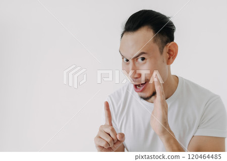 Funny tricky face man telling secret in white t-shirt isolate on white. Funny tricky face man telling secret in white t-shirt isolate on white. 120464485