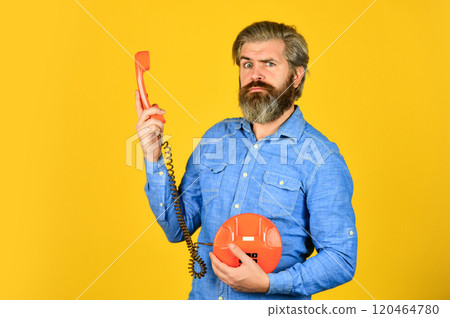 Outdated technology. Manager phone dialog communication. Answering machine. Bearded hipster man phone conversation. Successful negotiations. Retro phone. Marketing automation. Cold Calling Scripts Outdated technology. Manager phone dialog communication. Answering machine. Bearded hipster man phone conversation. Successful negotiations. Retro phone. Marketing automation. Cold Calling Scripts 120464780