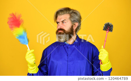 Cleaning apartment. Polypropylene duster. Hipster hold cleaning tool. Cleaning concept. Man use pp duster. Dust allergy. Husband cleaning home. Small duster. Cleaning service. Housekeeping duties 120464789