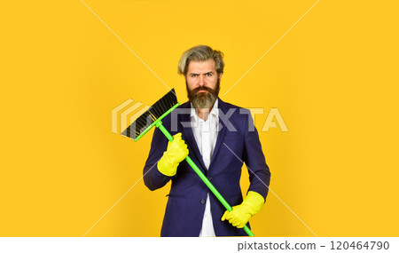 Cleaning day. Cleaning business. Household duties. Cleaning service concept. Clear reputation. Bearded man formal suit hold broom brush. Sweep in office. Hipster enjoy cleanliness. On guard of order 120464790