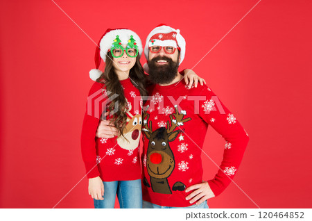 Be positive. santa man and kid ready for party. love and joy. father and daughter celebrate xmas. little girl with dad red background. happy new year. enjoy family holiday together. merry christmas 120464852