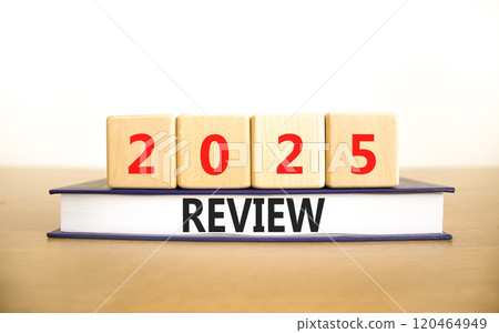 Planning 2025 review new year symbol. Concept words 2025 Review on beautiful wooden blocks and book. Beautiful wooden table white background. Business 2025 review new year concept. Copy space. 120464949