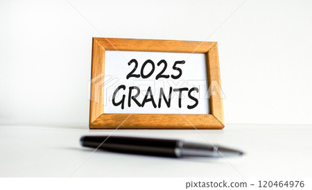Planning 2025 grants new year symbol. Concept words 2025 Grants on beautiful wooden picture frame. Beautiful white background. Black pen. Business 2025 grants new year concept. Copy space. Planning 2025 grants new year symbol. Concept words 2025 Grants on beautiful wooden picture frame. Beautiful white background. Black pen. Business 2025 grants new year concept. Copy space. 120464976