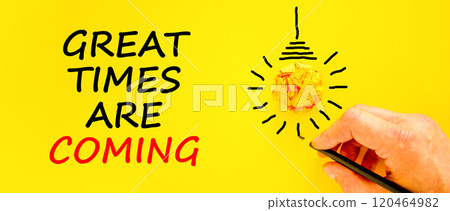 Great times are coming symbol. Concept words Great times are coming on beautiful yellow paper. Beautiful yellow background. Businessman hand. Business great times are coming concept. Copy space. 120464982