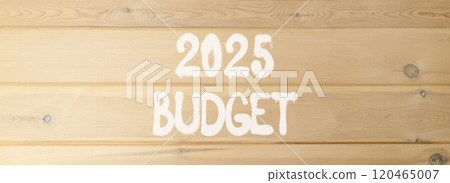 Planning 2025 budget new year symbol. Concept words 2025 Budget on beautiful wooden wall. Beautiful wooden wall background. Business 2025 budget new year concept. Copy space. 120465007