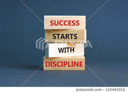 Success starts with discipline symbol. Concept words Success starts with discipline on beautiful wooden blocks. Beautiful grey background. Business success starts with discipline concept. Copy space Success starts with discipline symbol. Concept words Success starts with discipline on beautiful wooden blocks. Beautiful grey background. Business success starts with discipline concept. Copy space 120465018