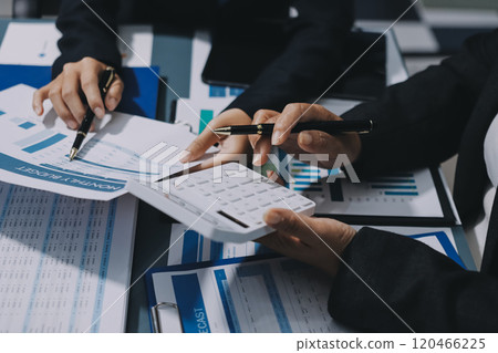 Fund managers team consultation and discuss about analysis Investment stock market at office 120466225