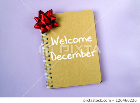The words Welcome December are written on a notepad The words Welcome December are written on a notepad 120466226