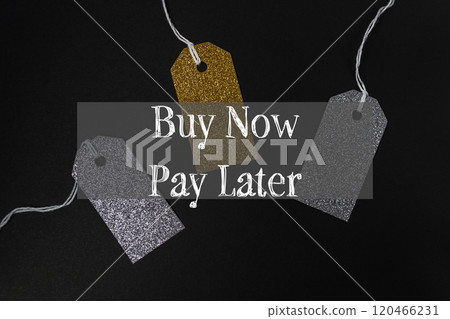Three tags with gold and silver glitter hanging from a string Three tags with gold and silver glitter hanging from a string 120466231