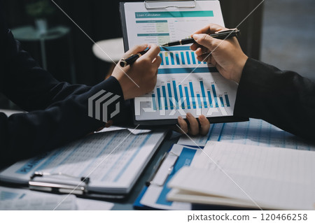 Fund managers team consultation and discuss about analysis Investment stock market at office 120466258