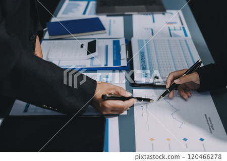 Fund managers team consultation and discuss about analysis Investment stock market at office 120466278