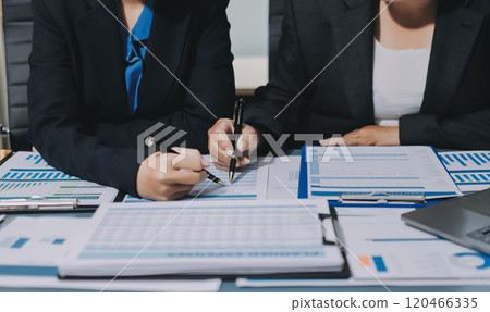 Fund managers team consultation and discuss about analysis Investment stock market at office 120466335
