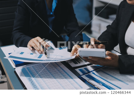 Fund managers team consultation and discuss about analysis Investment stock market at office 120466344