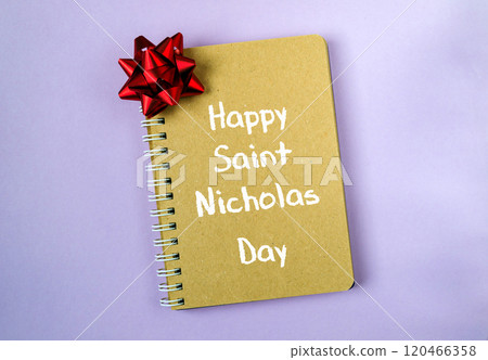 Traditional Happy Saint Nicholas Day greeting with bow and gifts Traditional Happy Saint Nicholas Day greeting with bow and gifts 120466358