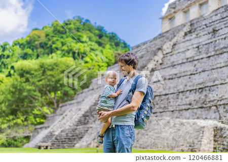 Father with his toddler son exploring the ancient pyramids of Palenque, Mexico, surrounded by dense jungle. Cultural heritage and adventure travel concept Father with his toddler son exploring the ancient pyramids of Palenque, Mexico, surrounded by dense jungle. Cultural heritage and adventure travel concept 120466881
