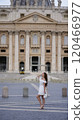 Graceful Woman Exploring St. Peters Basilica in Vatican Square  120466977