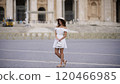 Graceful Woman Exploring St. Peters Basilica in Vatican City  120466985