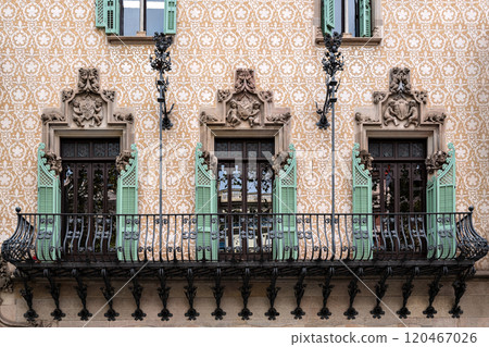 Balcony and three windows. 120467026