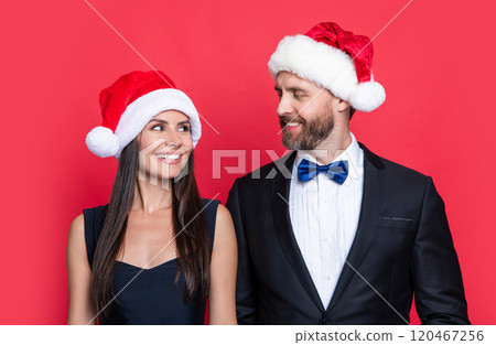 christmas party of cheerful santa couple. merry christmas to santa couple in studio. christmas party of cheerful santa couple. merry christmas to santa couple in studio. 120467256