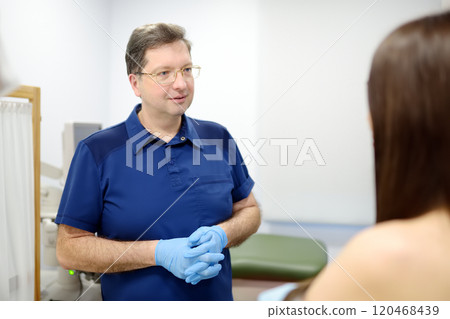 Doctor mammologist examines woman breasts. Correcting the shape of the breast - lift, reduction, reconstruction, augmentation. Problems of lactation. Breast cancer. Doctor mammologist examines woman breasts. Correcting the shape of the breast - lift, reduction, reconstruction, augmentation. Problems of lactation. Breast cancer. 120468439