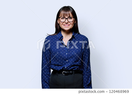 Portrait of smiling business mature woman on white background Portrait of smiling business mature woman on white background 120468969