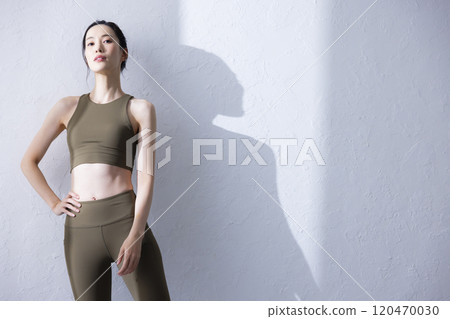 Woman in yoga wear Woman in yoga wear 120470030