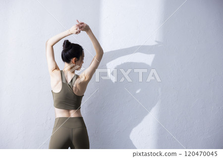 Woman in yoga wear Woman in yoga wear 120470045